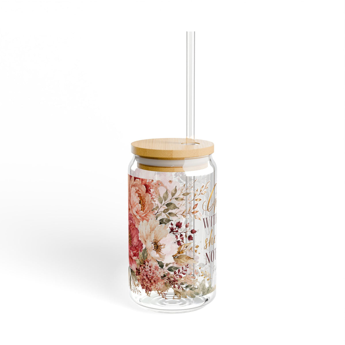 A clear glass tumbler with a bamboo lid and a clear straw, decorated with a watercolor floral pattern in pink, red, and green, and gold script lettering, on a white background.