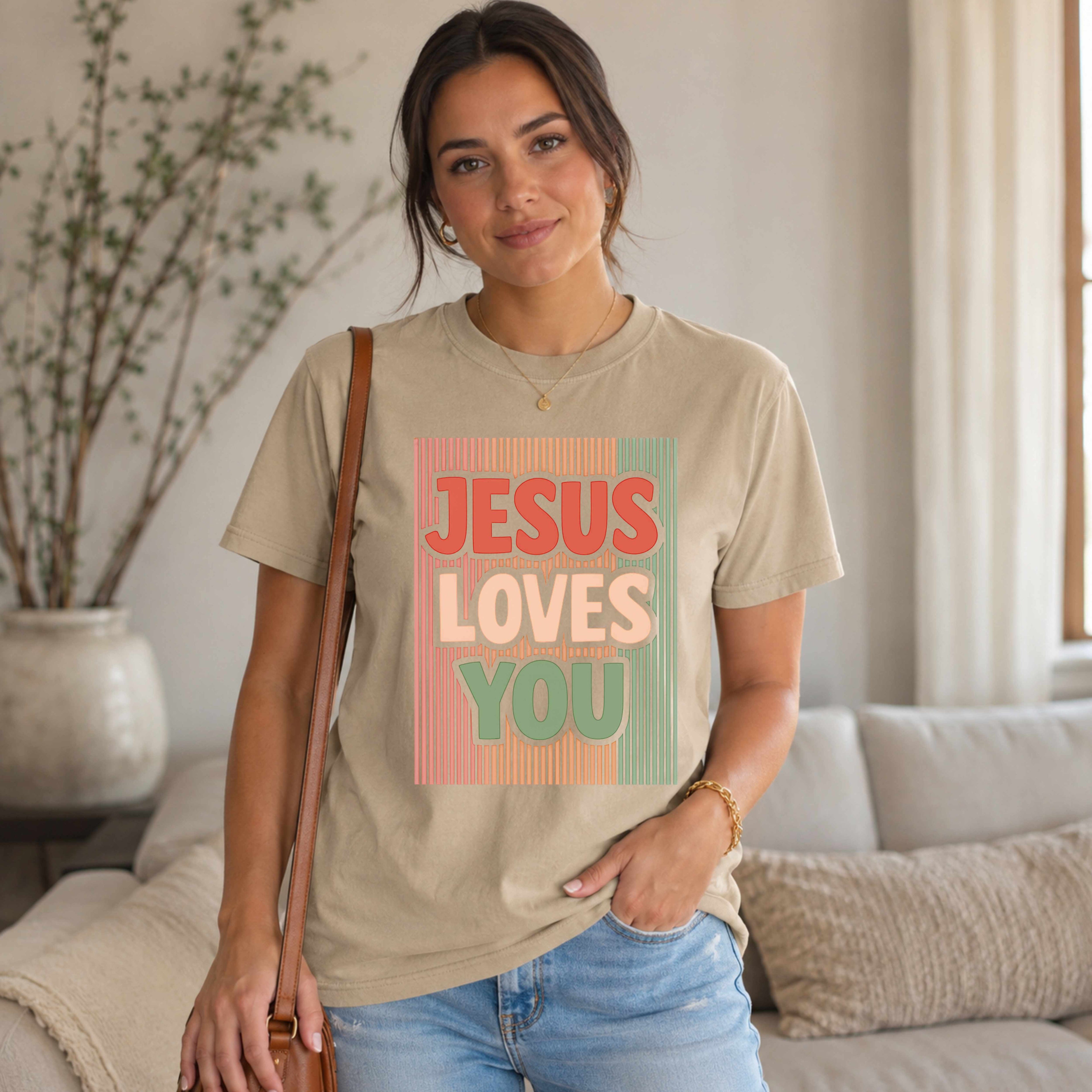 Woman wearing a t-shirt with 'Jesus Loves You' text in a home setting