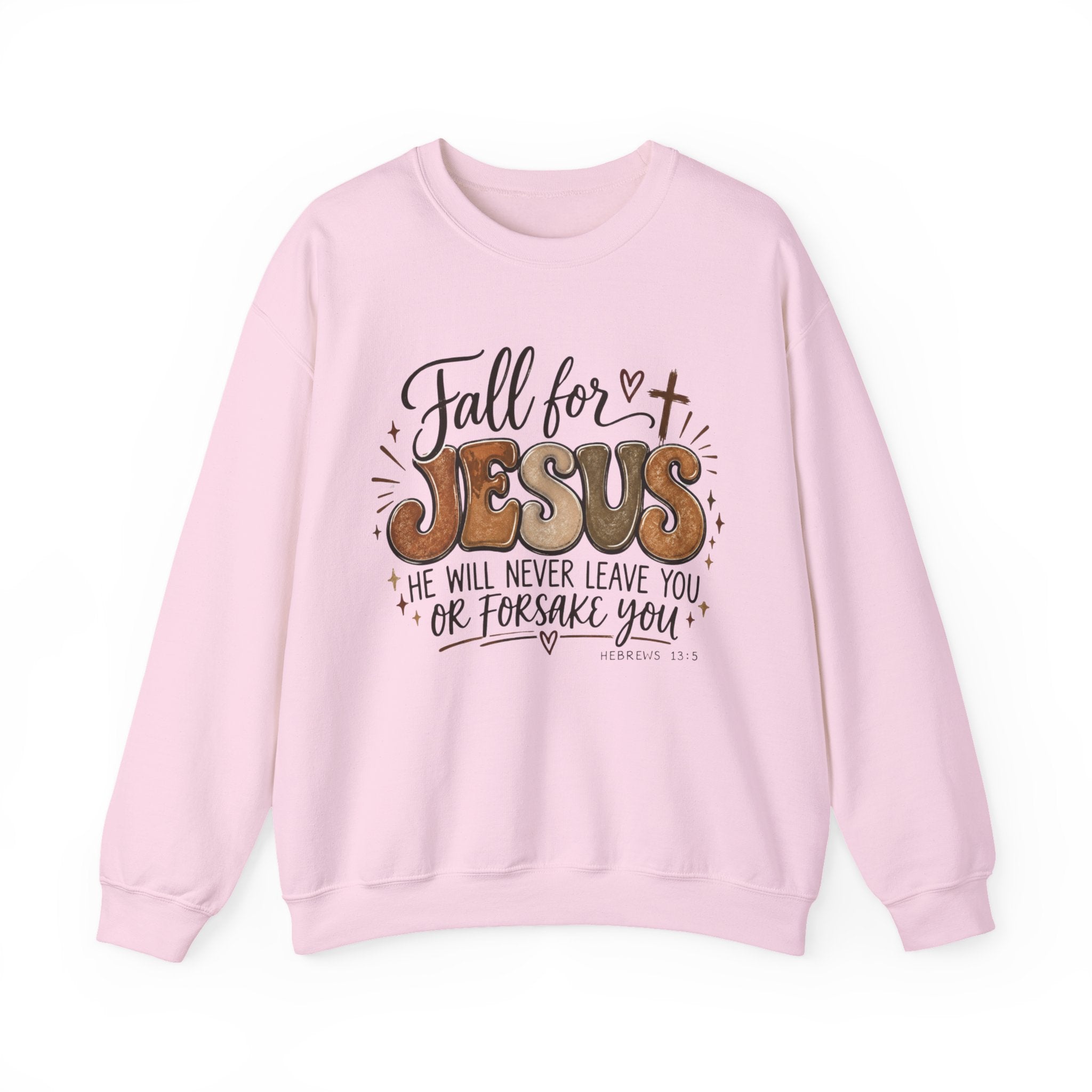 A light pink crewneck sweatshirt featuring a graphic print on the front with the text 'Fall for JESUS' and 'HE WILL NEVER LEAVE YOU OR FORSAKE YOU' along with a small cross and bible verse.