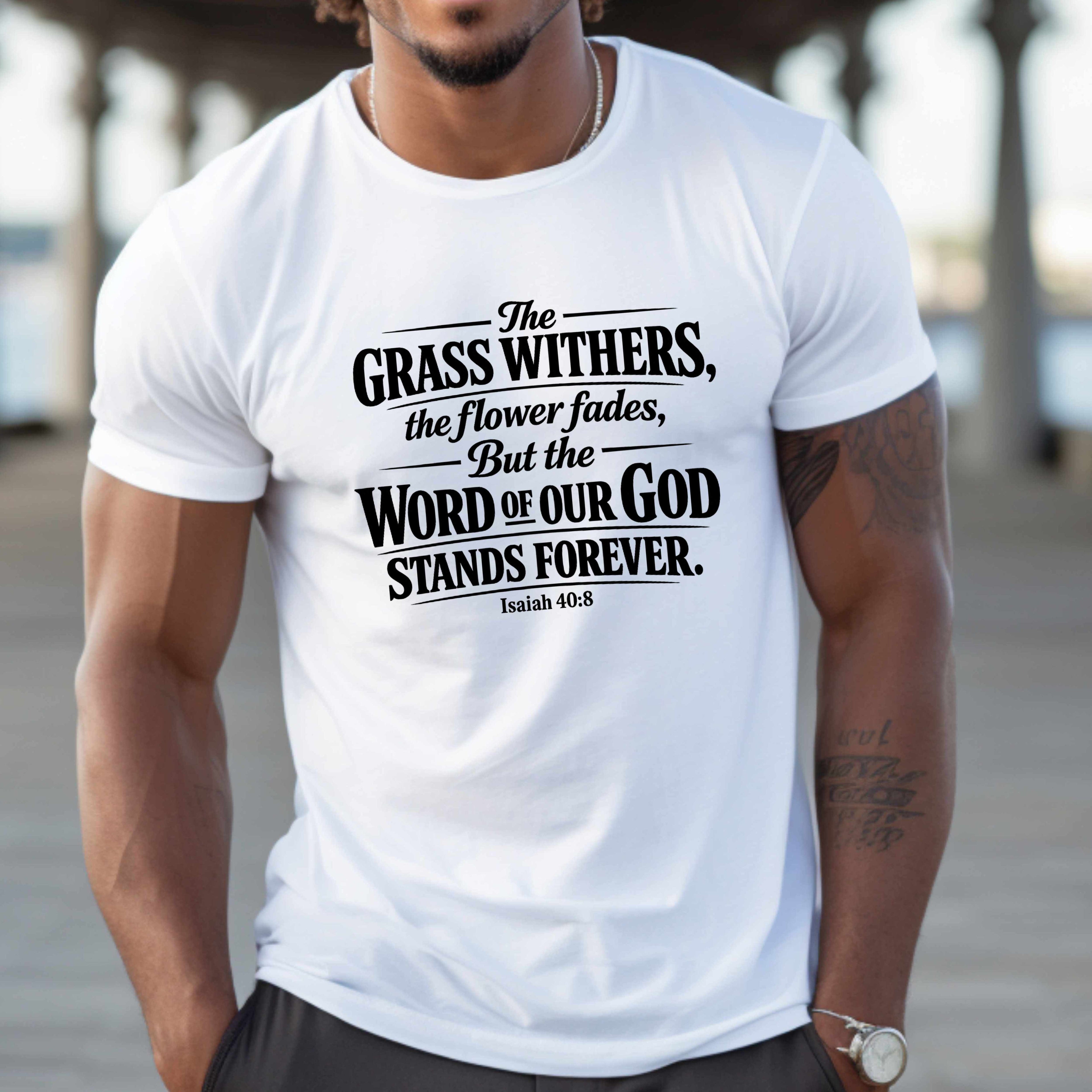 Man wearing a white t-shirt with a motivational quote on a blurred background